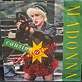 MADONNA - CAUSING COMMATION