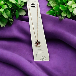 Çelik kolye rose gold ortası kırmızı taşlı