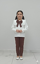 hem fiyonklu hem tokalı gömlekli pantolon takım